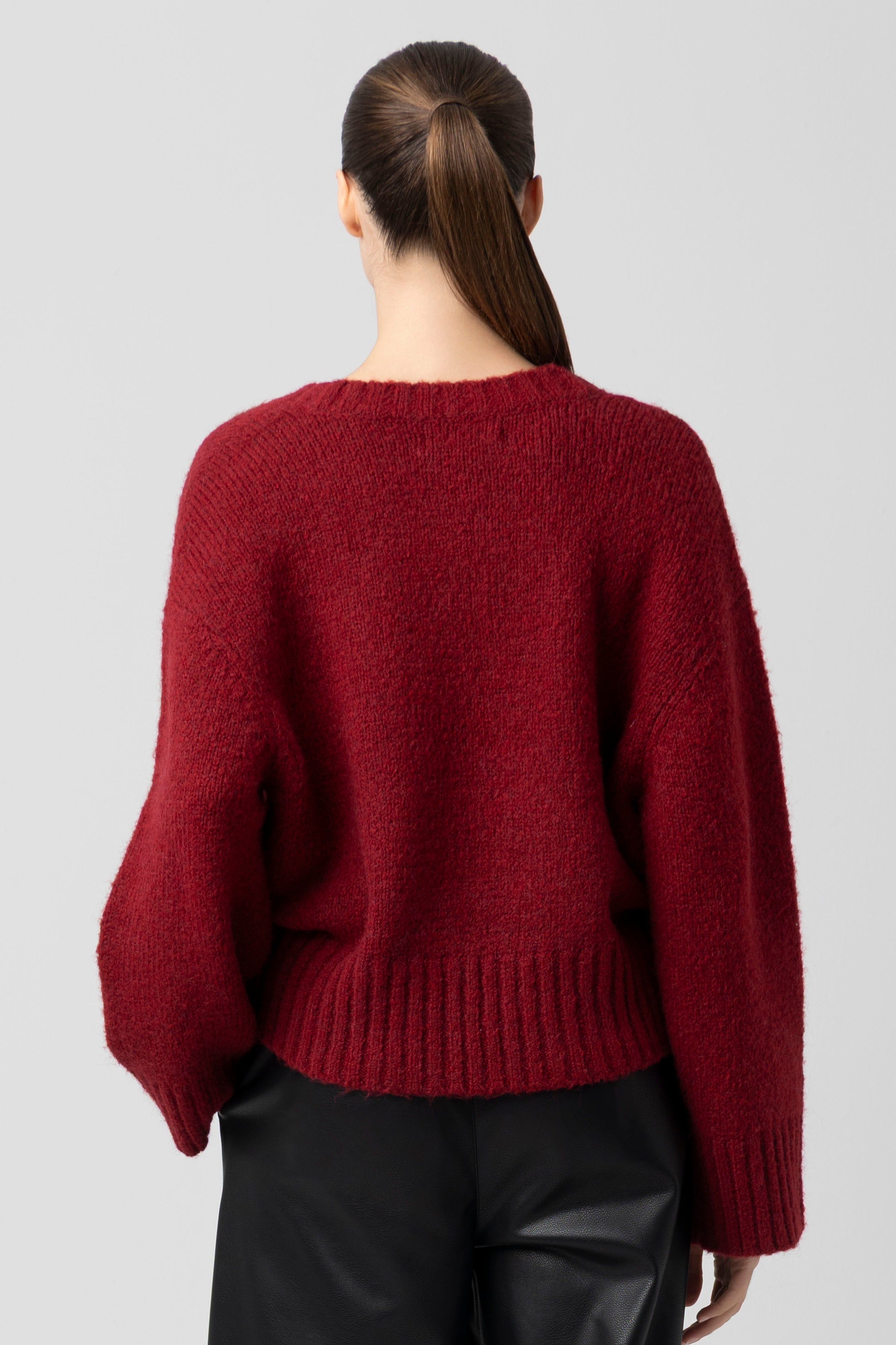 CRIMSON CREST SWEATER